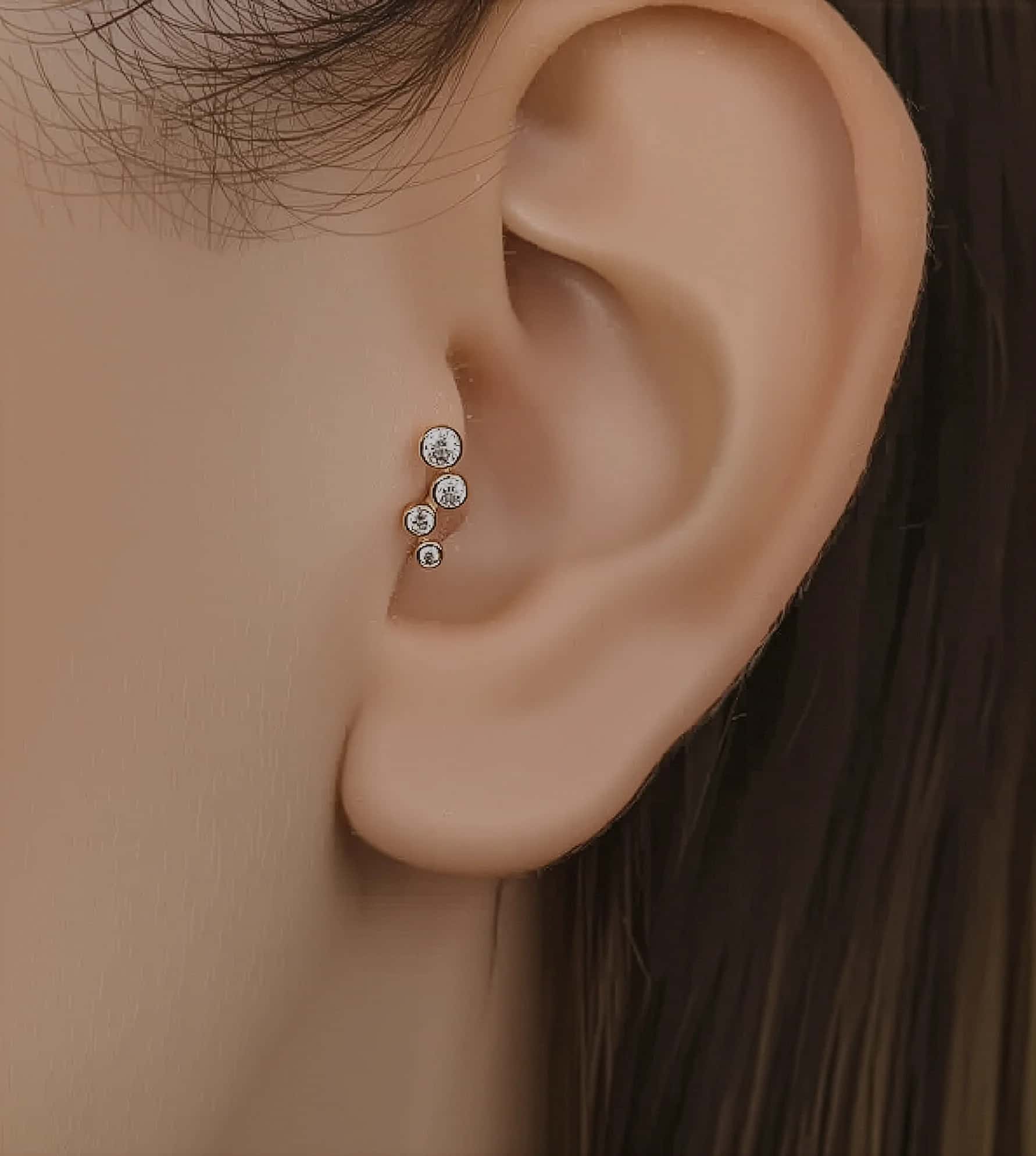 Dört Taş Piercing (Tragus) görseli 1